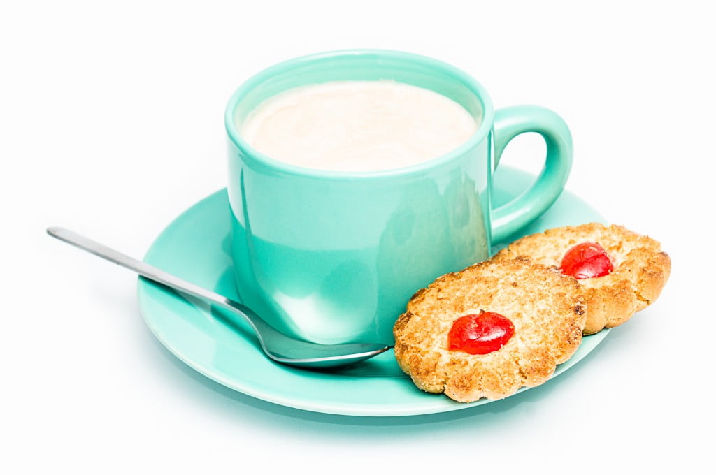 teal coffee cup with biscuits