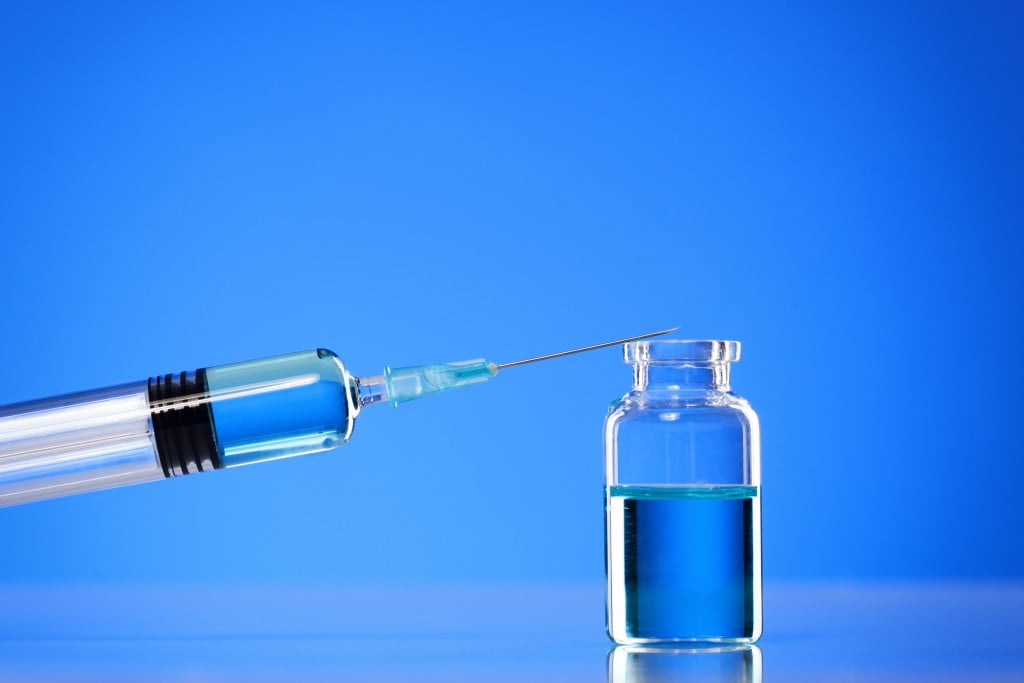 pharmacy jabs: vaccine on blue
