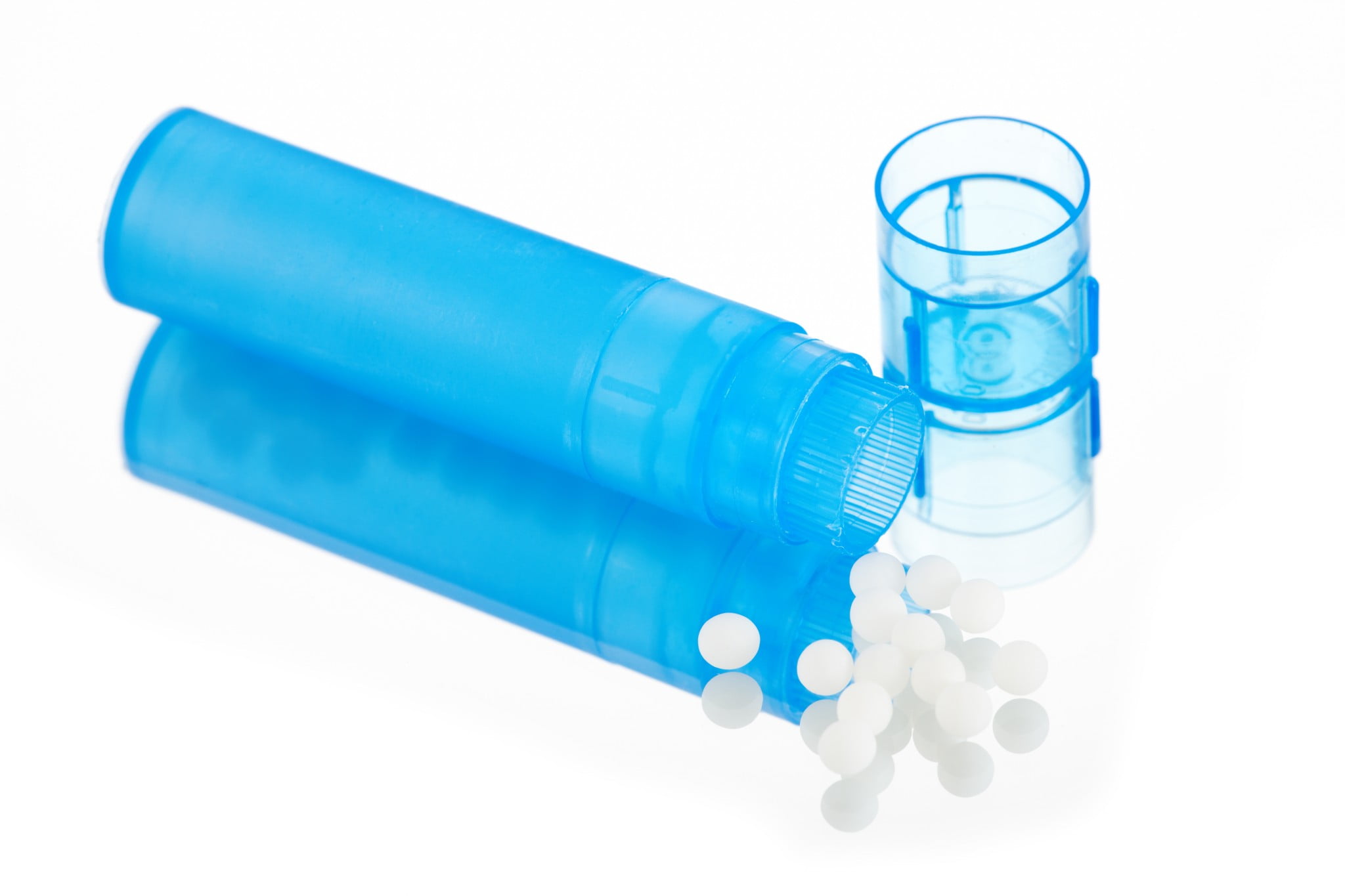 homoeopathy pills and blue bottle