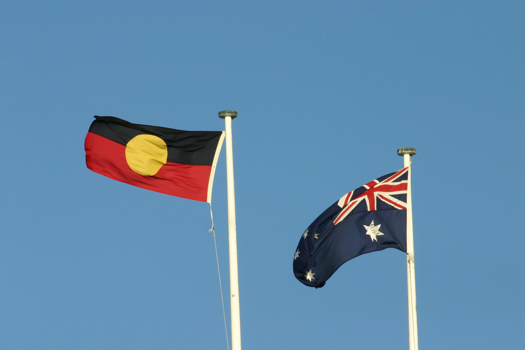 Aboriginal flag flies next to Australian flag