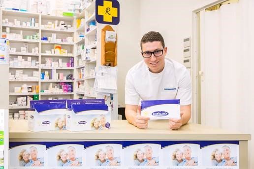 Pharmacist Andrew Biady of Blooms Chemist Cronulla shows he’s ready to support Rotary with the new bowel cancer test kits