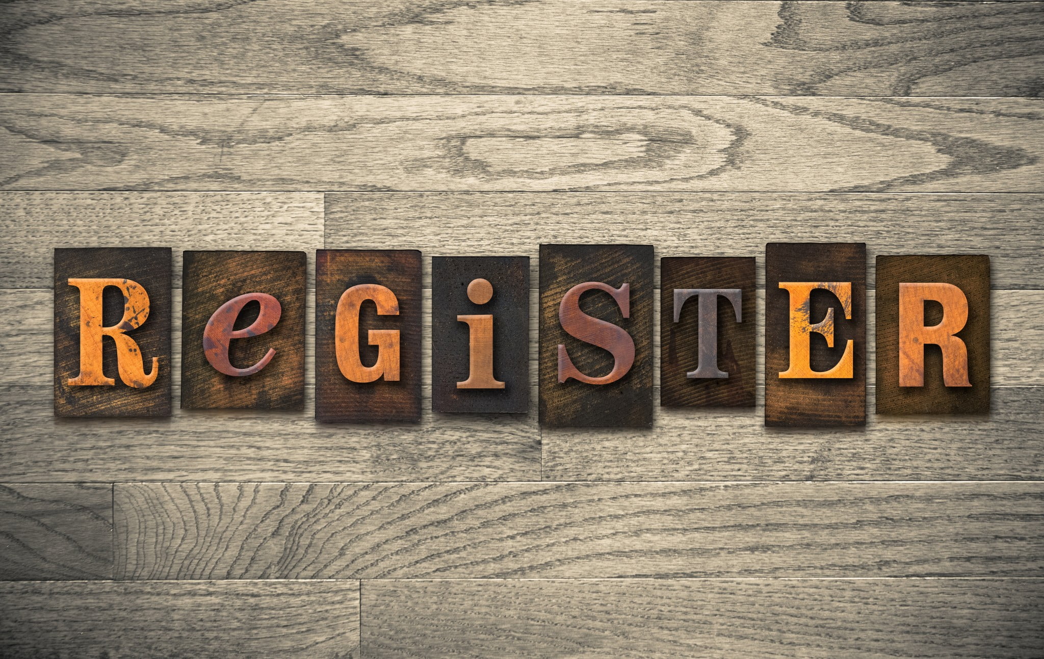 "register" in wooden type