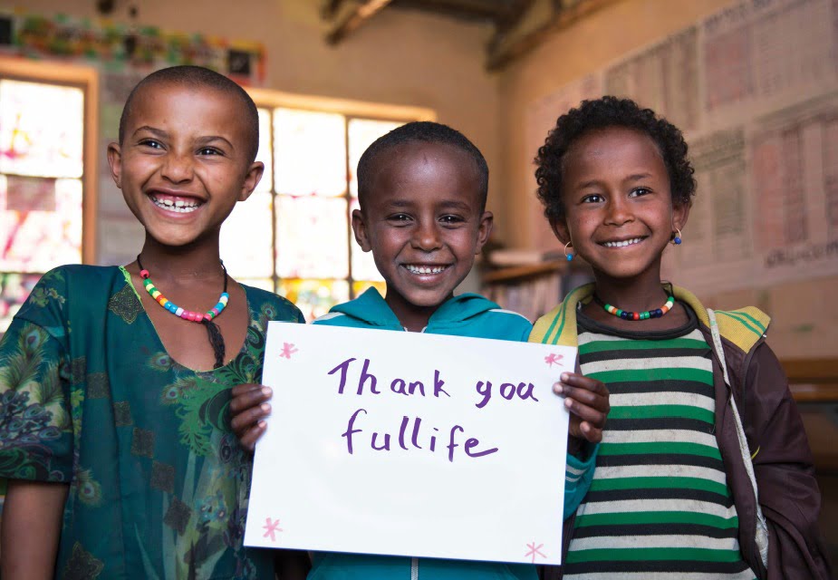 Fullife Pharmacy's sponsor kids in Ethiopia - three children smiling