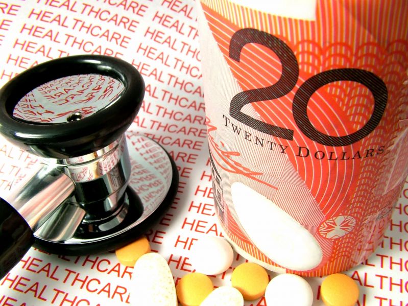 pharmacies better value: $20 note, pills, stethoscope