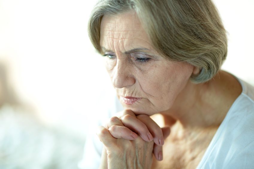 sad senior woman dementia