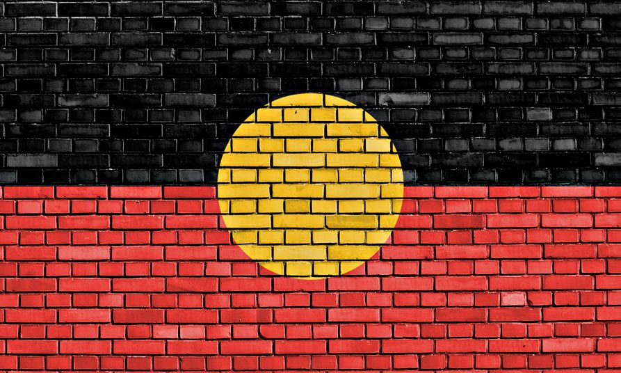 Aboriginal flag painted on bricks