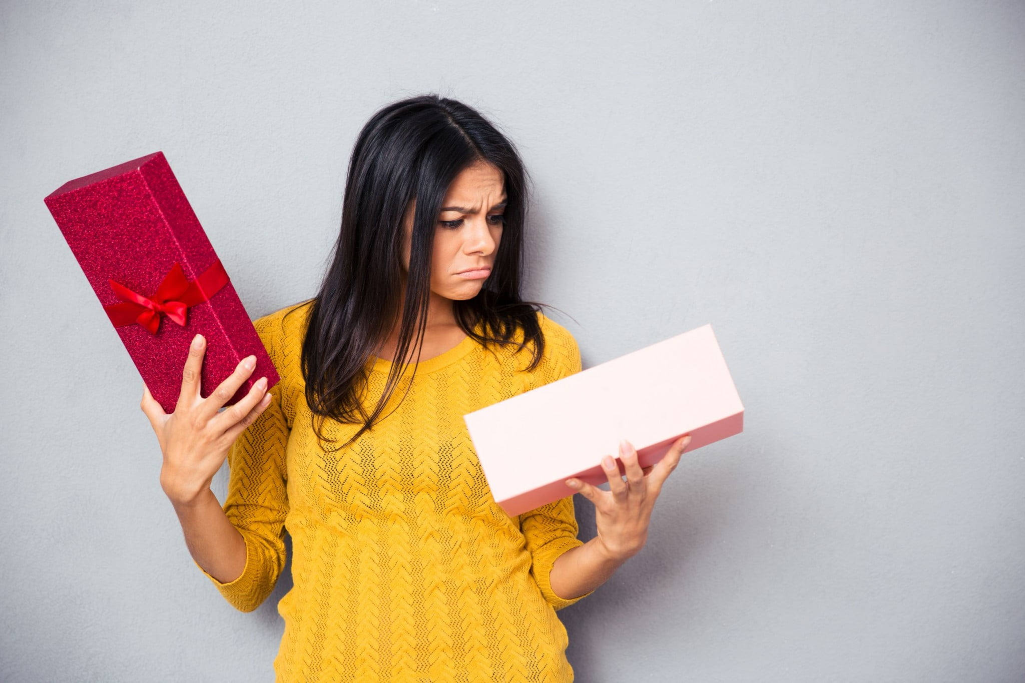 Woman opens Christmas gift and is unimpressed