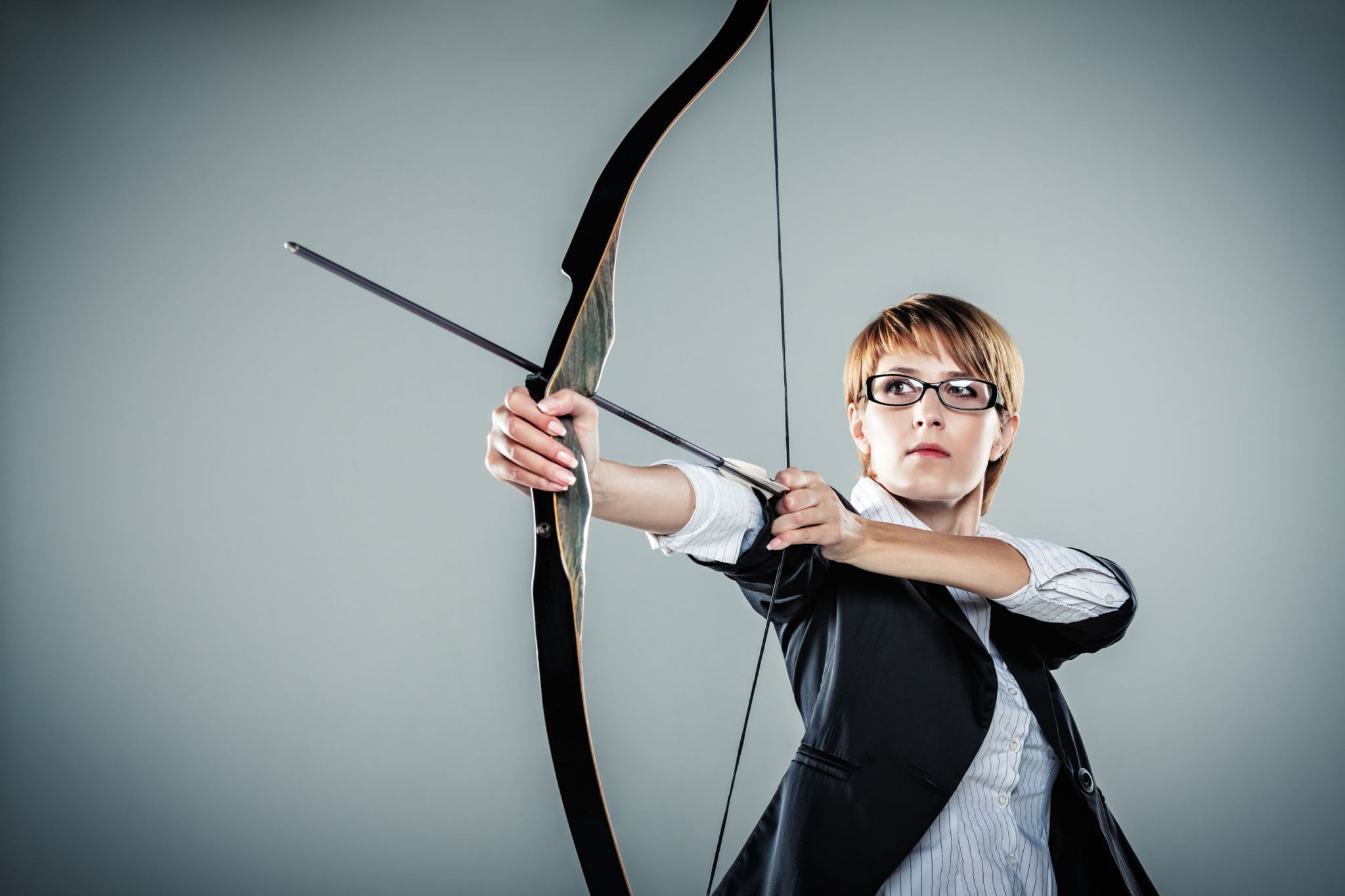 pharmacy hunger games: business woman with bow and arrow