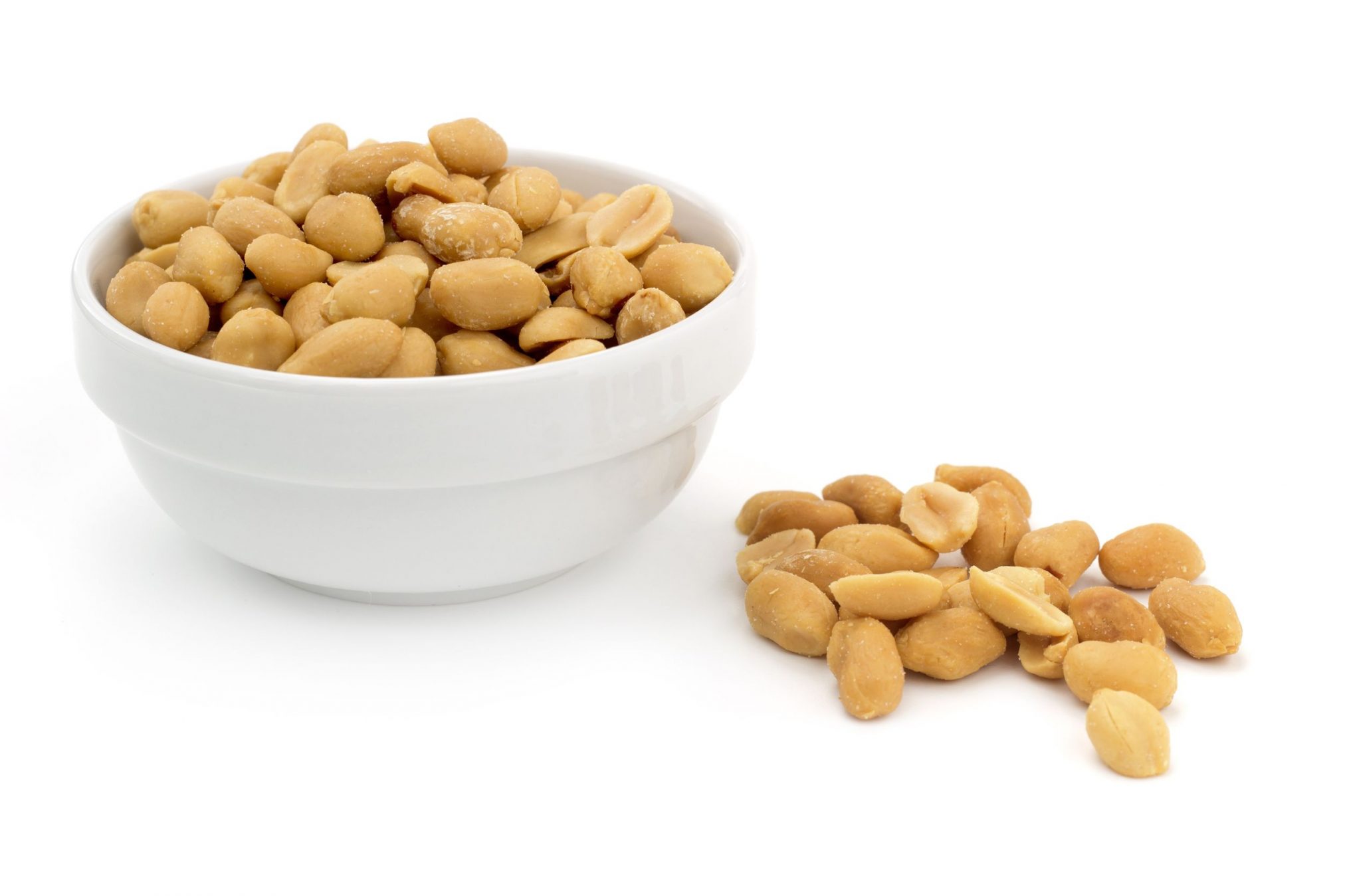 6450840 - bowl of shelled peanuts on white background
