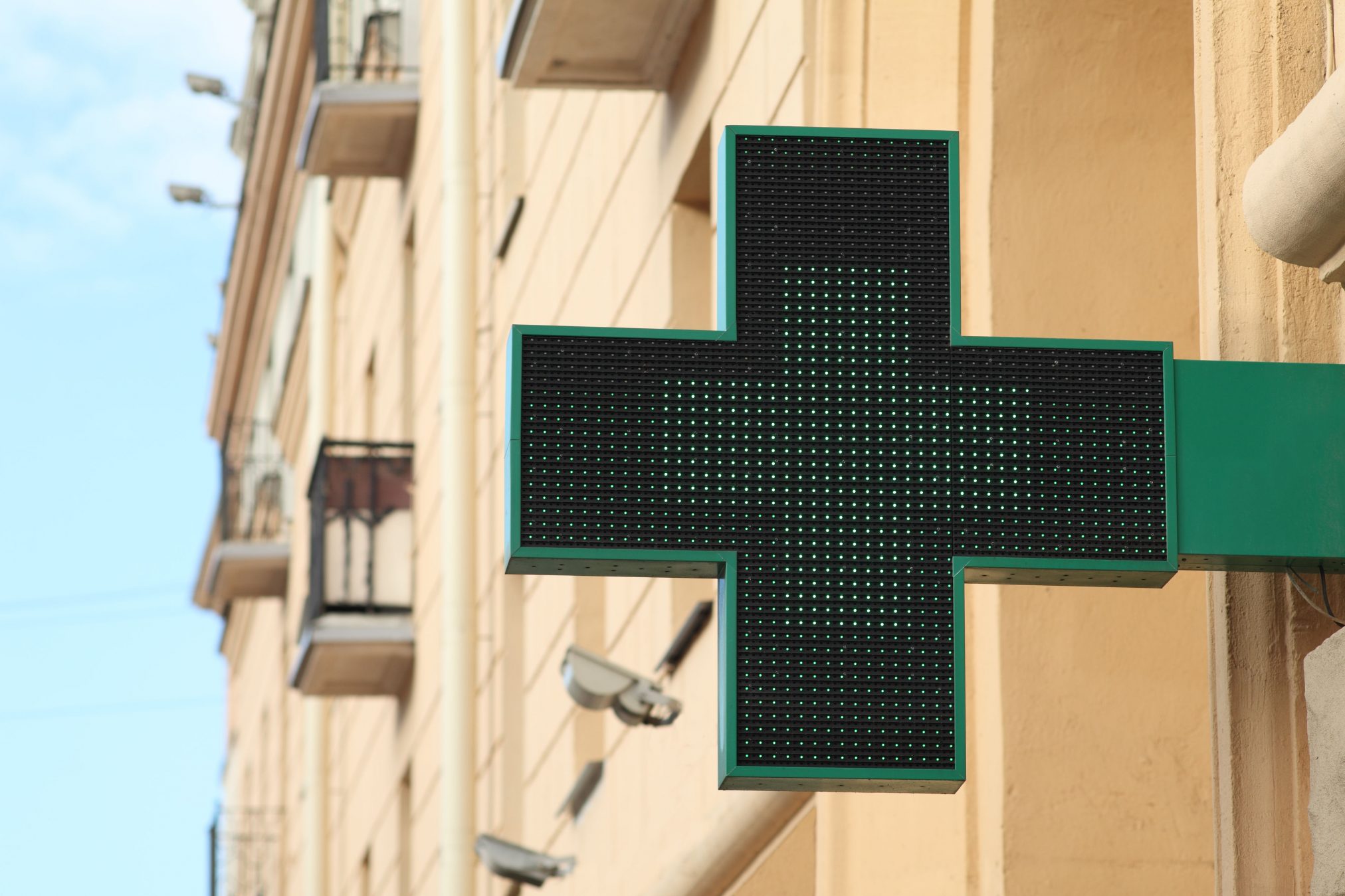 pharmacy sign green cross