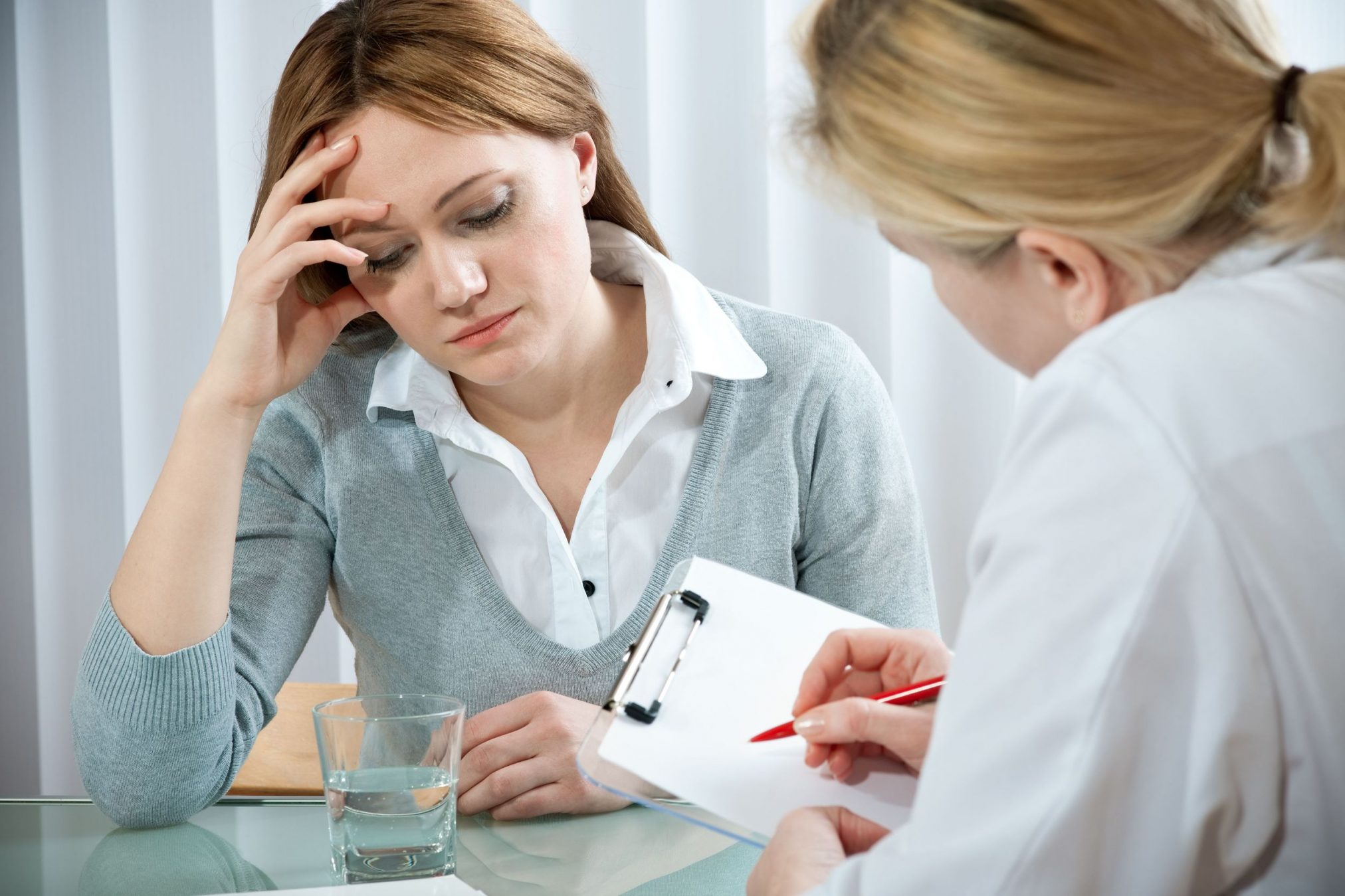 mental health depression sad woman pharmacist pharmacist counselling depressed