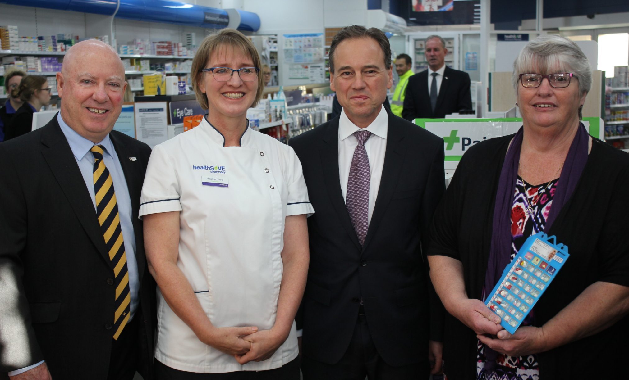 Guild Tas Branch President John Dowling, pharmacist Heather Wild, Health Minister Greg Hunt, and patient Wendy Donoghue who uses Dose Administration Aids