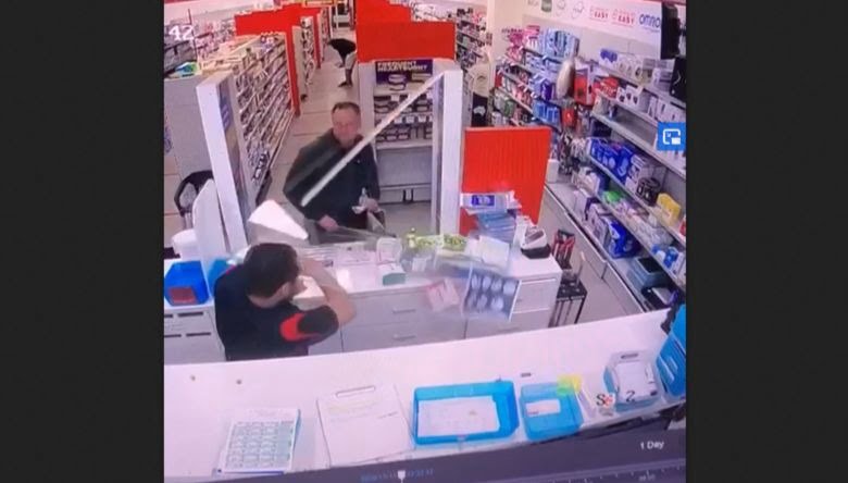 customer smashes screen guard into pharmacist's face
