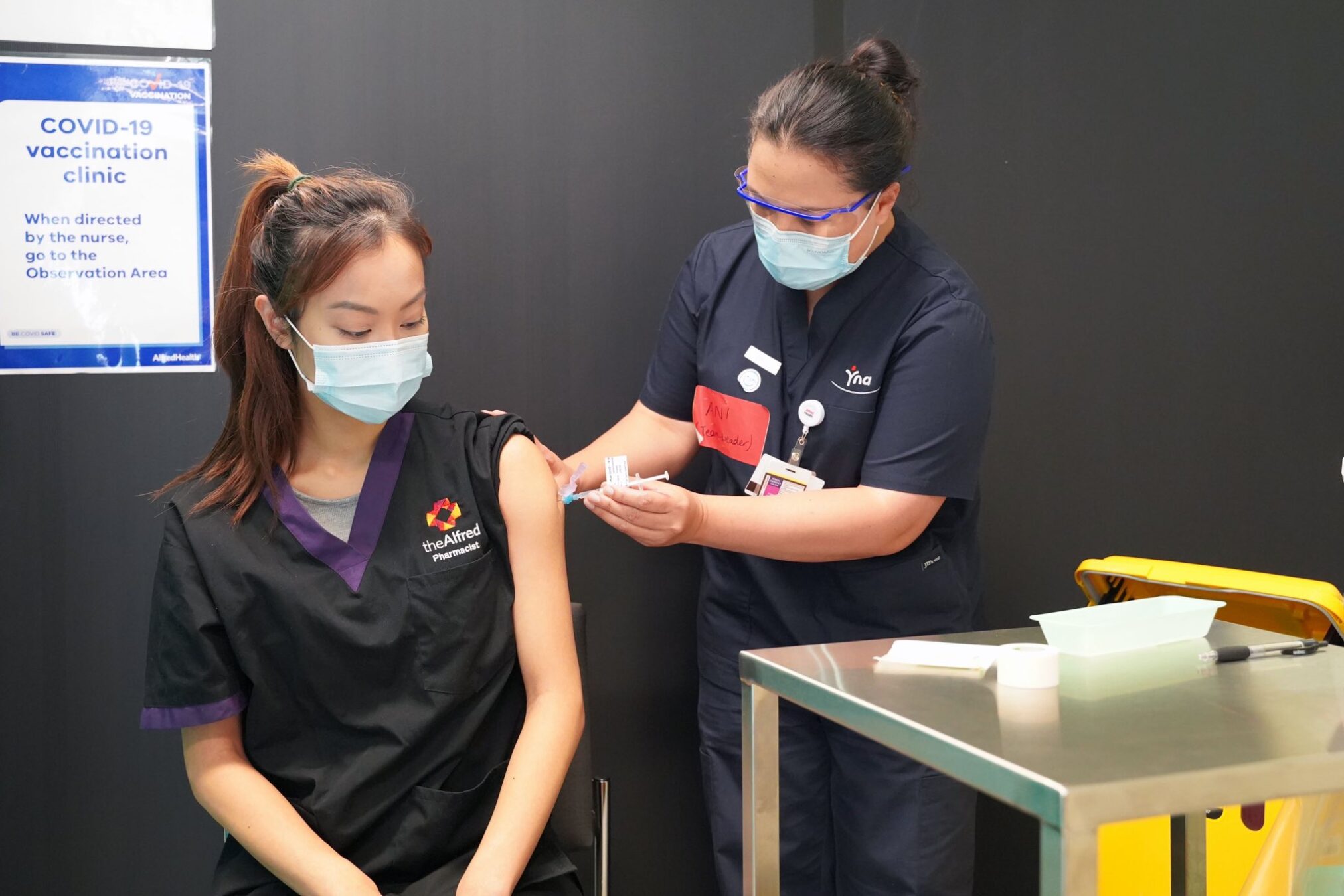 Uyen Hua is vaccinated against COVID-19.