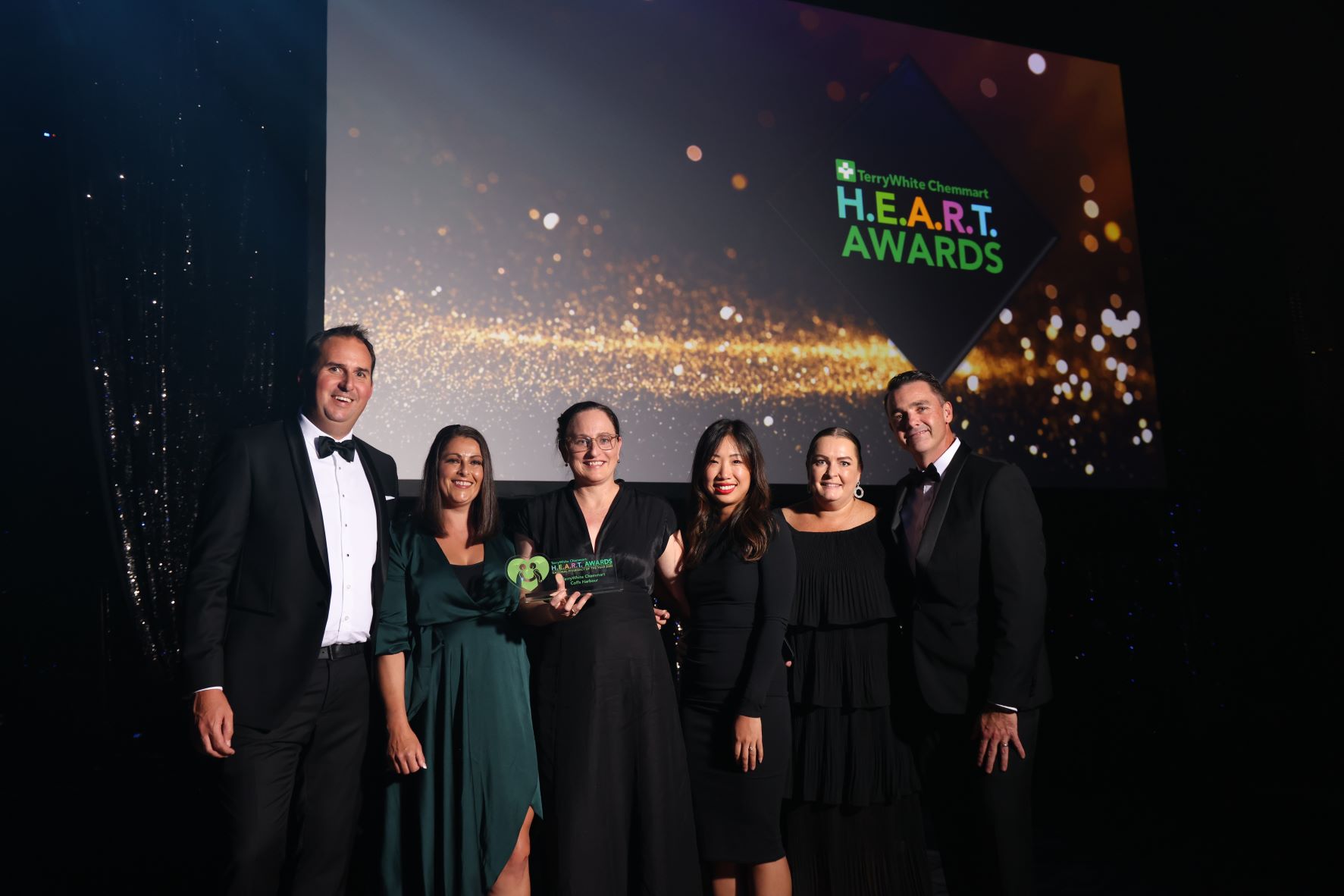 Pharmacy of the year 2022 national winner TWC Coffs Harbour, NSW team with Nick Munroe - TerryWhite Chemmart Executive General Manager and Michael Beaumont - TerryWhite Chemmart Group Operations Manager