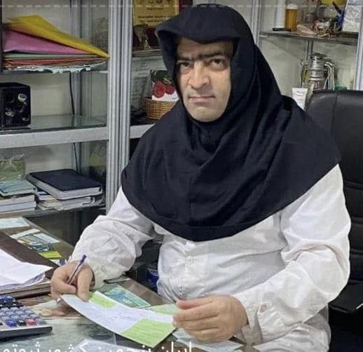 Male pharmacist shows support for female colleagues by wearing hijab. Image courtesy Masih Alinejad via Twitter.