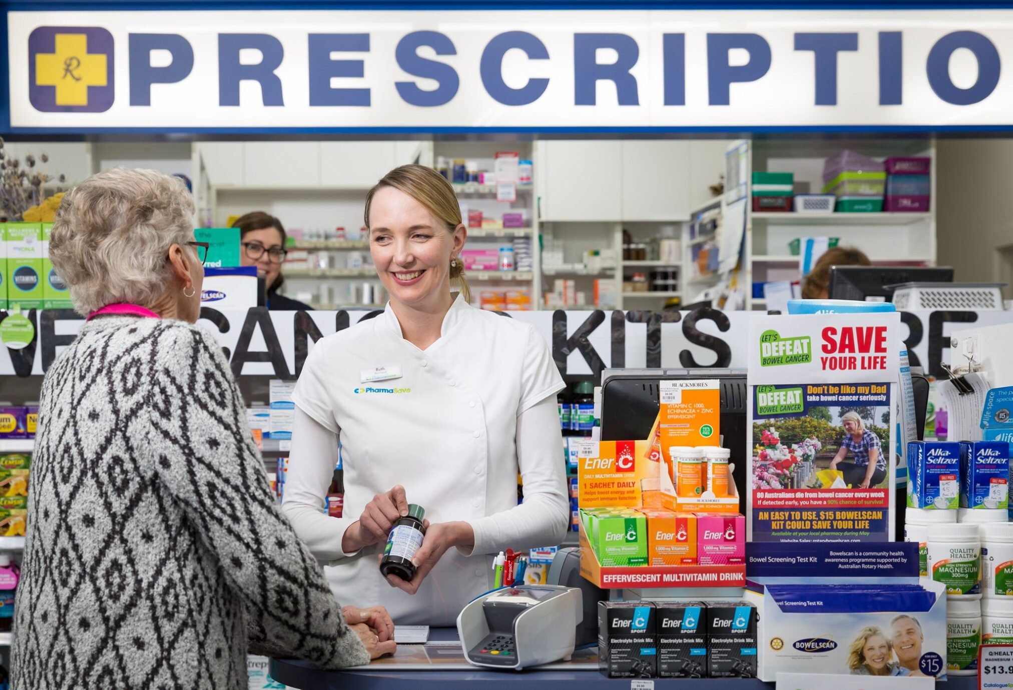 Ruth Parker dispensing medication to a patient - from Beechworth Pharmacy's Facebook page